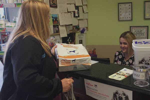 Client talking with receptionist