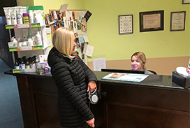 Client talking with a receptionist
